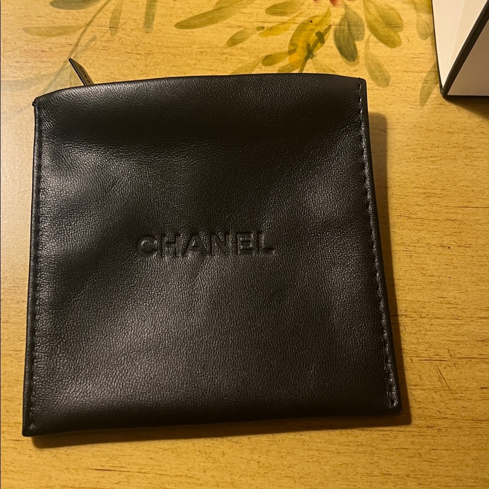 CHANEL Sleek Black Leather Jewelry pouch
